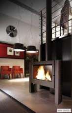 Печь-камин Invicta Antaya в интерьере чугунная Амазонка бай фото в Слониме