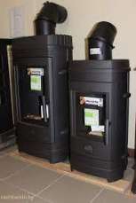 Печь-камин чугунный Invicta Remilly в интерьере Амазонка бай фото в Слониме