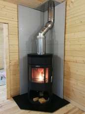 Недорогой камин с отделкой шамотом Сибирь 12 фото в интерьере в Слониме