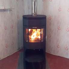 Недорогой камин с отделкой шамотом Сибирь 12 фото в интерьере в Слониме