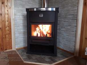 Стальной недорогой камин Теплодар ОВ-120 (угловой) фото в интерьере в Слониме