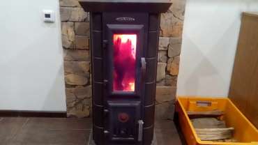 Стальная печь Термофор Статика Тетра, чёрная бронза фото в интерьере в Слониме