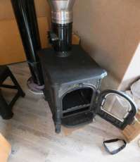 Недорогой печь-камин со стеклом Сибирь 6 фото в интерьере в Слониме