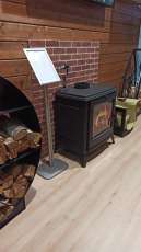 Купить чугунный Печь-камин EVEREST S13 в Слониме фото в интерьере в Слониме