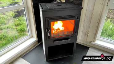 Недорогая печь-камин ЭТНА (Панорама) с плитой и теплообменником Амазонка бай фото в Слониме