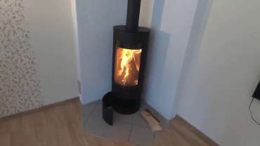 Стильная печь-камин с шамотом Мета-Бел Селигер в Слониме фото в интерьере в Слониме