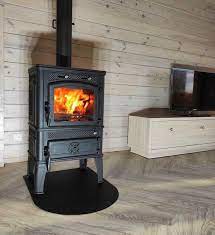 Печь-камин чугунный FireWay Dacha в интерьере чёрный Амазонка бай фото в Слониме