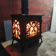 Печь-камин чугунный FireWay Demetra в интерьере Амазонка бай фото в Слониме