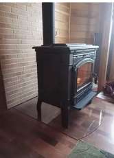 Печь-камин чугунный FireWay Gunter в интерьере чёрный Амазонка бай фото в Слониме