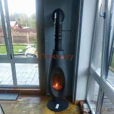 Печь-камин чугунный Invicta OVATIO в интерьере Амазонка бай фото в Слониме